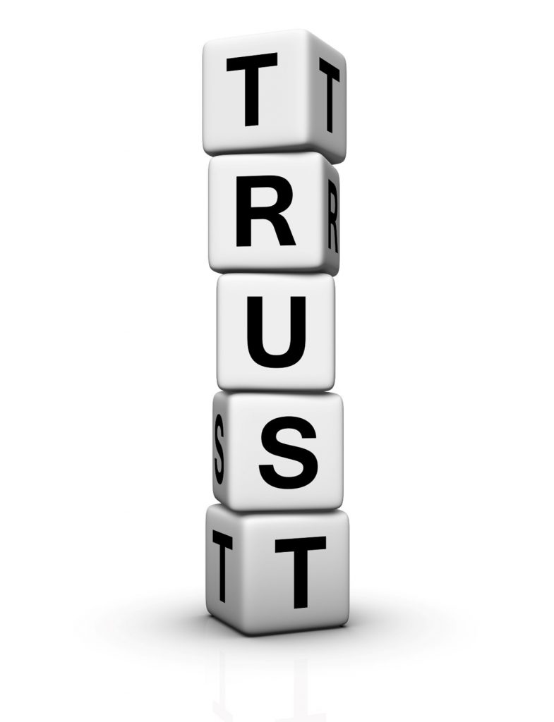 Picture of Dice with the word Trust